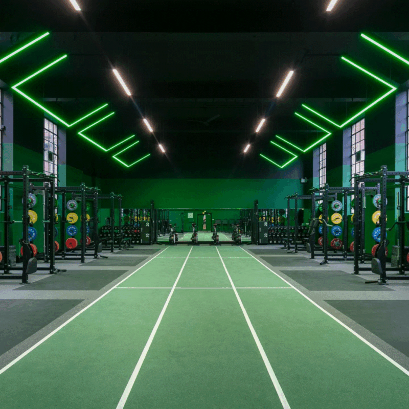 Green RGBW Linear Lights in a gym