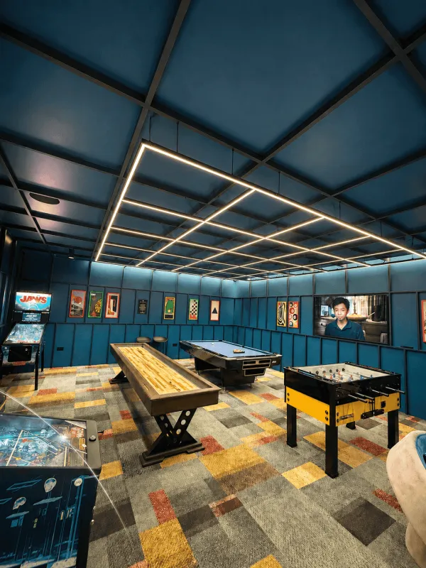 Stylish grid lighting in the games room at Waterhouse Gardens Manchester.